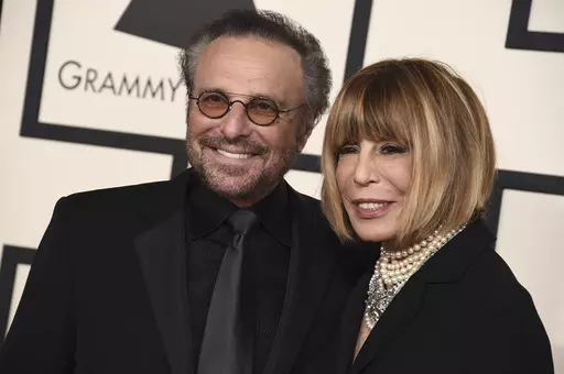 Barry Mann, left, and Cynthia Weil arrive at the 57th annual Grammy Awards at the Staples Center on Sunday, Feb. 8, 2015, in Los Angeles. Weil, a Grammy-winning lyricist of great range and endurance who enjoyed a decades-long partnership with husband Mann and helped write "You've Lost That Lovin' Feeling," "On Broadway," "Walking in the Rain" and dozens of other hits, has died at age 82. Weil and Mann, married in 1961, were one of popular music's most successful teams. (Photo by Jordan Strauss/I