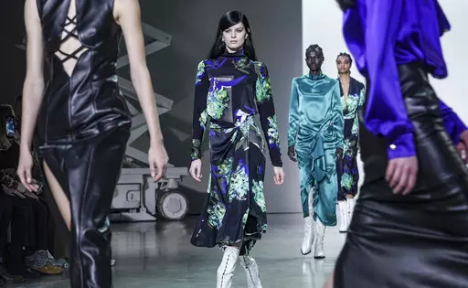 Fashion from Prabal Gurung is modeled during Fashion Week, Wednesday, Feb. 16, 2022, in New York. (AP Photo/Bebeto Matthews)