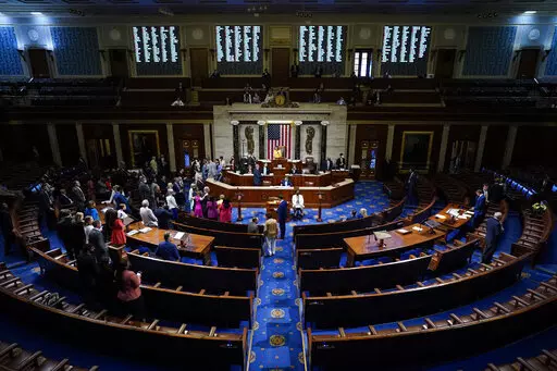 House Speaker Nancy Pelosi of Calif., finishes the vote to approve the Inflation Reduction Act in the House chamber at the Capitol in Washington, Friday, Aug. 12, 2022.  On Friday, Aug. 25, The Associated Press reported on stories circulating online incorrectly claiming Congress exempted its members from IRS audits. (AP Photo/Patrick Semansky, File).  i