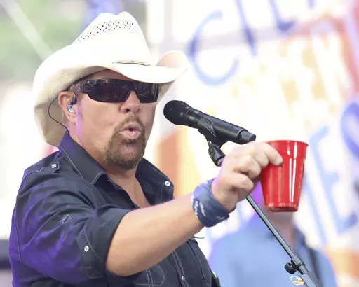 Country music recording artist Toby Keith holds a red Solo cup as he performs on NBC's Today show at Rockefeller Plaza on July 5, 2019, in New York. Keith, who died Monday at 62, immortalized the humble plastic cups in his 2011 hit "Red Solo Cup."(Photo by Greg Allen/Invision/AP, File)