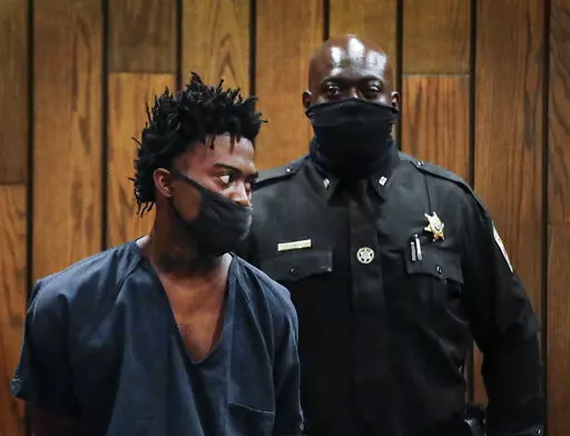 Ezekeil Kelly, left makes his first court appearance on Friday, Sept. 9, 2022 in Memphis, Tenn. Kelly is  accused of killing four people and wounding three others in a livestreamed shooting rampage that paralyzed Memphis and led to a city-wide manhunt.  (Mark Weber/Daily Memphian via AP)