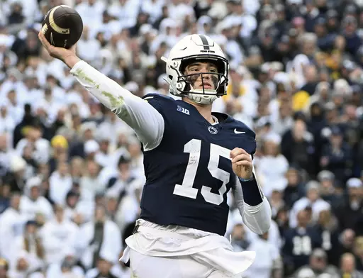 Penn State quarterback Drew Allar passes against Michigan during the second half of an NCAA college football game Nov. 11, 2023, in State College, Pa. Mississippi will play for the first 11-win season in school history when the Rebels of the Southeastern Conference, led by quarterback Jaxson Dart, face Penn State, led by Allar, in the Peach Bowl, Saturday, Dec. 30, 2023. (AP Photo/Barry Reeger, File)