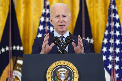 President Joe Biden speaks from the East Room of the White House in Washington, Dec. 6, 2021. The Biden administration is distributing an additional $4.5 billion in funds to help low-income Americans cover heating costs during a second pandemic winter, with cold-weather states receiving the largest share. (AP Photo/Susan Walsh, FIle)