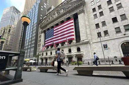 American flags hang on the front of the New York Stock Exchange on Sept. 11, 2024, in New York. (AP Photo/Peter Morgan, File)