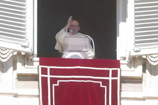 Pope Francis blesses the faithful from his studio's window overlooking St. Peter's Square on the occasion of the Angelus noon prayer at the Vatican, Sunday, Oct. 16, 2022.(AP Photo/Gregorio Borgia)