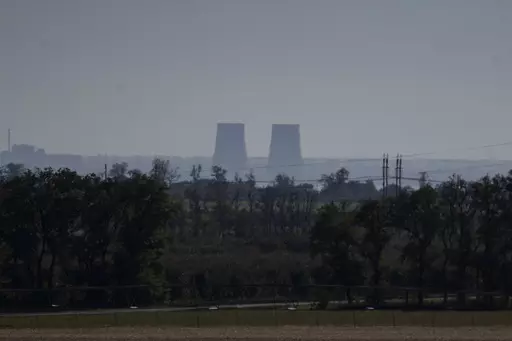 Zaporizhzhia nuclear power plant is seen from around twenty kilometers away in an area in the Dnipropetrovsk region, Ukraine, Monday, Oct. 17, 2022. A statement released Friday, May 26, 2023, by the intelligence directorate of Ukraine's Defense Ministry claimed that Russian forces would strike the Zaporizhzhia nuclear power plant, the biggest in Europe, and then report a radioactive leak in order to trigger an international probe that would pause the hostilities and give the Russian forces the r