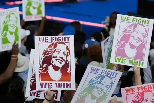Attendees display signs for Democratic presidential nominee Vice President Kamala Harris during a campaign rally Thursday, Oct. 24, 2024, in Clarkston, Ga. (AP Photo/Mike Stewart)
