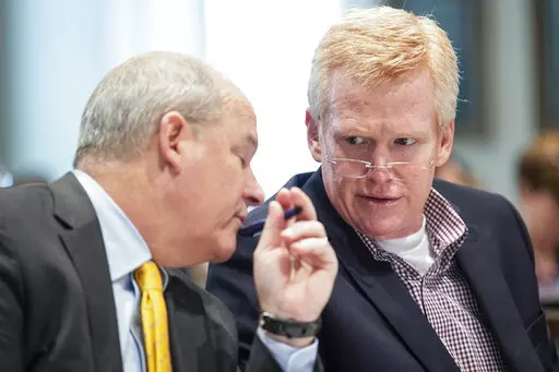 Alex Murdaugh and his defense attorney Jim Griffin listen to testimony during Murdaugh's double murder trial at the Colleton County Courthouse on Wednesday, Feb. 8, 2023, in Walterboro, S.C. The 54-year-old attorney is standing trial on two counts of murder in the shootings of his wife and son at their Colleton County home and hunting lodge on June 7, 2021. (Joshua Boucher/The State via AP, Pool)