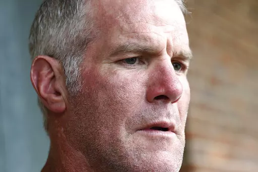 Former NFL quarterback Brett Favre speaks to the media in Jackson, Miss., Oct. 17, 2018. The governor of Mississippi in 2017 was “on board” with a plan for a nonprofit group to pay Brett Favre more than $1 million in welfare grant money so the retired NFL quarterback could help fund a university volleyball facility, according to a text messages between Favre and the director of the nonprofit in court documents filed Monday, Sept. 12, 2022. (AP Photo/Rogelio V. Solis, File)