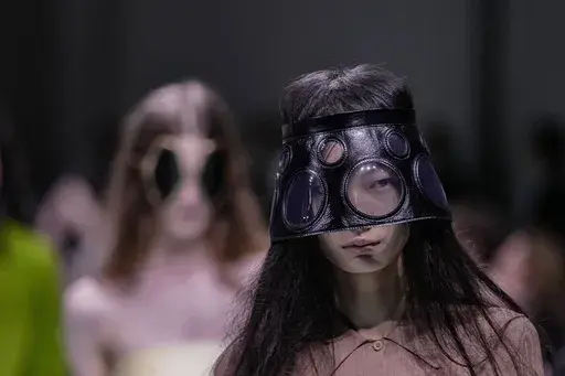 A model wears a creation as part of the Prada Spring Summer 2025 collection, that was presented in Milan, Italy, Thursday, Sept. 19, 2024. (AP Photo/Luca Bruno)