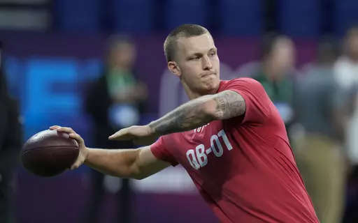 Shepherd quarterback Tyson Bagent runs a drill at the NFL football scouting combine in Indianapolis, Saturday, March 4, 2023. Bagent played most of his college career in relative obscurity at Division II Shepherd College in West Virginia. (AP Photo/Michael Conroy, File)