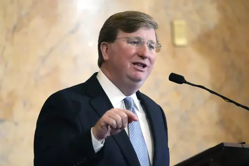 Mississippi Republican Gov. Tate Reeves delivers his State of the State address to the Mississippi State Legislature, Feb. 26, 2024, at the state Capitol in Jackson, Miss. Reeves has signed a new law Tuesday, March 12, that will allow women to receive Medicaid coverage earlier in pregnancy. (AP Photo/Rogelio V. Solis, File)