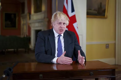 British Prime Minister Boris Johnson records an address to the nation at Downing Street, London, to provide an update on the booster vaccine programme, Sunday, Dec. 12, 2021. (Kirsty O'Connor, Pool via AP)