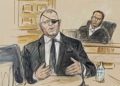 This artist sketch depicts the trial of Oath Keepers leader Stewart Rhodes, left, as he testifies before U.S. District Judge Amit Mehta on charges of seditious conspiracy in the Jan. 6, 2021, attack on the U.S. Capitol, in Washington, Nov. 7, 2022. Rhodes and members of his antigovernment group will be the first Jan. 6 defendants sentenced for seditious conspiracy in a series of hearings beginning this week that will set the standard for more punishments of far-right extremists to follow. (Dana 