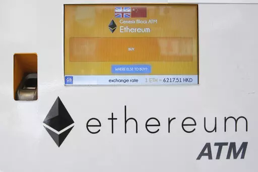 An ethereum ATM is seen in Hong Kong, Friday, May 11, 2018. A complex software change enacted Wednesday, Sept. 14, 2022, to the cryptocurrency ethereum holds the potential to dramatically reduce its energy consumption — and resulting climate-related pollution. But the transition known as "the merge" is not going to do the trick by itself. (AP Photo/Kin Cheung, File)