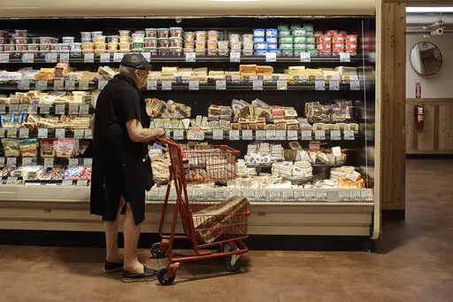A man shops at a supermarket on Wednesday, July 27, 2022, in New York. On Thursday, Oct. 13, 2022, the U.S. government is set to announce what's virtually certain to be the largest increase in Social Security benefits in 40 years. The boost is meant to allow beneficiaries to keep up with inflation, and plenty of controversy surrounds the move. (AP Photo/Andres Kudacki, File)