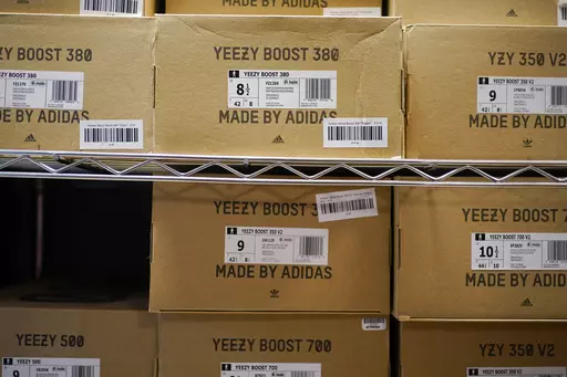 Boxes containing Yeezy shoes made by Adidas are seen at Laced Up, a sneaker resale store, in Paramus, N.J., Tuesday, Oct. 25, 2022. Adidas saw operating earnings dwindle in the first three months of the year as the German sportswear company's breakup with the rapper formerly known as Kanye West and his popular Yeezy shoe brand cost it 400 million euros ($441 million) in lost sales. Profit was down to 60 million euros from 437 million euros in the same quarter a year ago, while profit margin shra