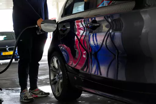 Motorists in the Netherlands headed to the pumps after a government reduction in duties on fuel entered into force to help motorists hit by soaring fuel prices, in Amsterdam, Netherlands, Friday, April 1, 2022. Inflation hit a new record for the 19 countries that use the euro as skyrocketing fuel prices boosted by the war in Ukraine add new burdens to household finances and weigh on a slowing economic recovery from the latest outbreaks of COVID-19, the European Union's statistics agency Eurostat