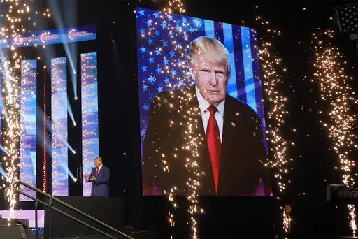Republican presidential nominee former President Donald Trump arrives at a Turning Point Action campaign rally, Wednesday, Oct. 23, 2024, in Duluth, Ga. (AP Photo/Alex Brandon)