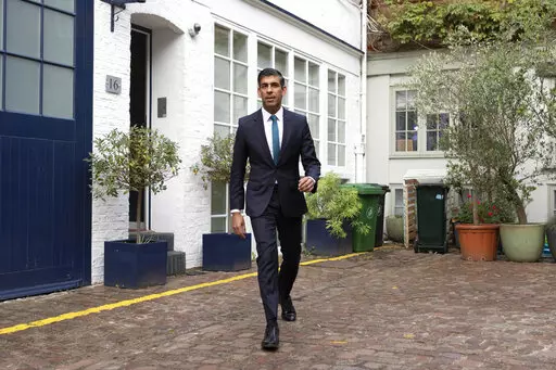 Rishi Sunak outside his home in London, following the resignation of Liz Truss as Prime Minister, Friday Oct. 21, 2022. British Prime Minister Liz Truss resigned Thursday, bowing to the inevitable after a tumultuous, short-lived term in which her policies triggered turmoil in financial markets and a rebellion in her party that obliterated her authority. (Beresford Hodge/PA via AP)