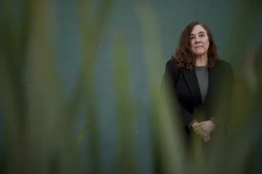 Gabrielle Longhi poses for a portrait, Friday, March 8, 2024, in Los Angeles. In a recent lawsuit, Longhi alleges she was sexually abused at Stone Ridge School of the Sacred Heart in Bethesda, Maryland. The sexual abuse of children by Catholic nuns often has been overlooked in the Catholic clergy abuse crisis, but survivors of nun abuse hope to raise awareness of the issue. (AP Photo/Eric Thayer)