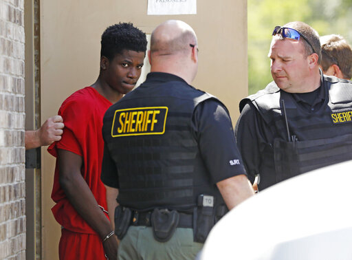 D'Allen Washington leaves the Madison County Justice Court, June 26, 2017, in Canton, Miss. A parole board has released one of three men convicted in the kidnapping and 2017 death of a 6-year-old boy who was asleep in the backseat of a car that was stolen from a grocery store parking lot. Washington pleaded guilty in 2018 and was sentenced to 15 years in prison for accessory after the fact in the kidnapping of Kingston Frazier. He was released Tuesday, Feb. 1, 2022. (AP Photo/Rogelio V. Solis, f