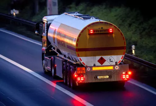 A fuel trucks drives along a highway in Frankfurt, Germany, Jan. 27, 2023. European Union governments tentatively agreed Friday Feb. 3, 2023, to set a $100-per-barrel price cap on sales of Russian diesel to coincide with an EU embargo on the fuel — steps aimed at ending the bloc's energy dependence on Russia and limiting the money Moscow makes to fund its war in Ukraine. (AP Photo/Michael Probst, File)