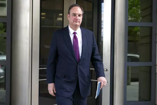 Attorney Michael Sussmann leaves federal court in Washington, April 27, 2022. A criminal case brought by special counsel John Durham, the prosecutor appointed to investigate potential government wrongdoing in the early days of the Trump-Russia probe, heads to trial in Washington's federal court on May 16. The case centers on a single false statement that Sussmann, a cybersecurity lawyer who represented the Hillary Clinton presidential campaign in 2016, is alleged to have made to the FBI during a