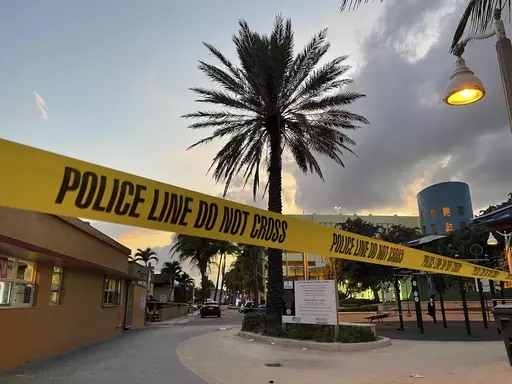 Police cordon off an area as they respond to a shooting near the Hollywood Beach Broadwalk in Hollywood, Fla., Monday evening, May 29, 2023. Recent high-profile mass shootings highlight what can be a deadly mix of teenage bravado and immaturity with growing access to high-powered guns that can kill faster and more efficiently than ever. (Mike Stocker/South Florida Sun-Sentinel via AP, File)