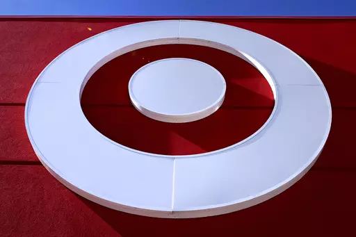 The bullseye logo on a Target store is shown in the South Bay neighborhood of Boston, on Feb. 28, 2022. Target reports earnings on Wednesday. (AP Photo/Charles Krupa, File)