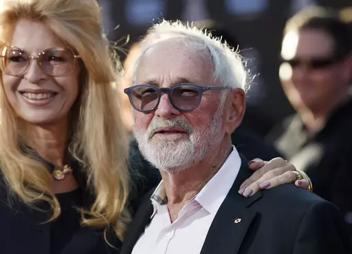 Norman Jewison, center, director of the 1967 film "In the Heat of the Night," appears with his wife Lynne St. David before a 50th anniversary screening of the film at the 2017 TCM Classic Film Festival in Los Angeles on April 6, 2017. Jewison, a three-time Oscar nominee who in 1999 received an Academy Award for lifetime achievement, died “peacefully” Saturday, Jan. 20, 2024, according to publicist Jeff Sanderson. He was 97. (Photo by Chris Pizzello/Invision/AP, File)