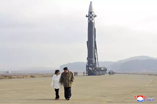 This photo provided on Nov. 19, 2022, by the North Korean government shows North Korean leader Kim Jong Un, right, and his daughter inspect the site of a missile launch at Pyongyang International Airport in Pyongyang, North Korea, Friday, Nov. 18, 2022. North Korea’s state media said its leader Kim oversaw the launch of the Hwasong-17 missile, a day after its neighbors said they had detected the launch of an ICBM potentially capable of reaching the continental U.S. Independent journalists were