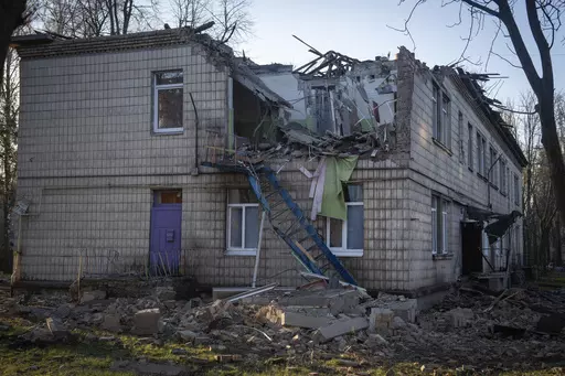 A damaged kindergarten following a Russian drone attack in Kyiv, Ukraine, Saturday, Nov. 25, 2023. Russia launched its most intense drone attack on Ukraine since the beginning of its full-scale invasion on Saturday morning, military officials said. (AP Photo/Efrem Lukatsky)