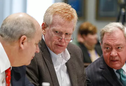 Defendant Alex Murdaugh, seated between his two layers Jim Griffin and Dick Harpootlian, listens during his double murder trial at the Colleton County Courthouse in Walterboro, S.C., Friday, Jan. 27, 2023. (Grace Beahm Alford/The Post And Courier via AP, Pool)