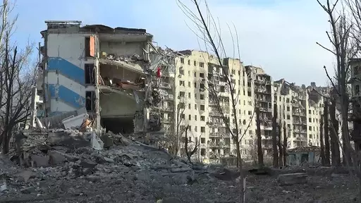 This photo taken from video released by the head of the Russian-controlled Donetsk region Denis Pushilin's telegram channel on Saturday, Feb. 24, 2024, shows damaged buildings, after Russian forces completed their takeover of Avdiivka, eastern Ukraine. Russian-controlled Donetsk region. (Head of the Russian-controlled Donetsk region Denis Pushilin telegram channel via AP)
