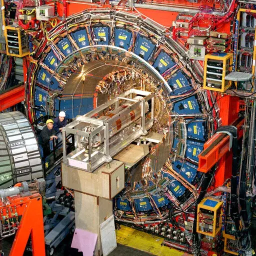This undated photo provided by the Fermi National Accelerator Laboratory in April 2022 shows the facility's Collider Detector outside Batavia, Ill. In results released on Thursday, April 7, 2022, scientists at the lab calculated that the W boson, a fundamental particle of physics, weighs a bit more than their theoretical rulebook for the universe tells them it should. (Fermilab via AP)
