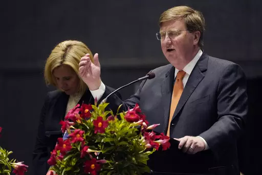 Mississippi's Republican Gov. Tate Reeves offers a prayer during a National Day of Prayer gathering at the Mississippi Coliseum in Jackson, Miss., Thursday, May 4, 2023. Reeves said Wednesday, May 17, that he has mobilized a National Guard unit to help with security at the U.S. border with Mexico. (AP Photo/Rogelio V. Solis, File)