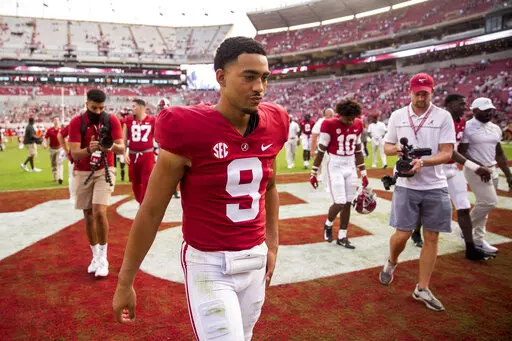 Alabama quarterback Bryce Young (9) walks off the field victorious after an NCAA college football game against Mercer, Saturday, Sept. 11, 2021, in Tuscaloosa, Ala. (AP Photo/Vasha Hunt)