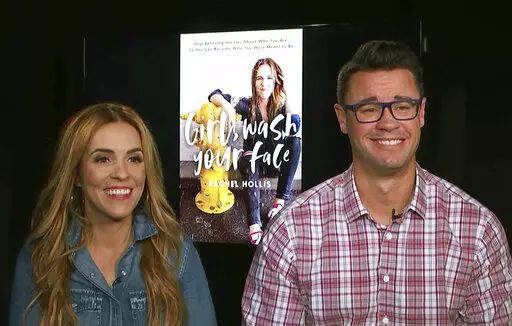 This image taken from video shows Rachel Hollis, left, author of "Girl, Wash Your Face: Stop Believing the Lies About Who You Are so You Can Become Who You Were Meant to Be," and her husband Dave Hollis, during an interview on Aug. 28, 2018, in New York. Dave Hollis, who left his spot as a Disney executive to join this then-wife Rachel in running her lifestyles empire, which include her bestselling book “Girl, Wash Your Face,” has died at his home in Texas on Sunday, Feb. 12, 2023. He was 47