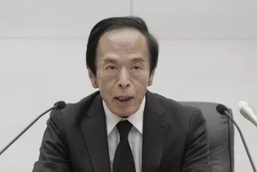 Kazuo Ueda, the governor of the Bank of Japan speaks during a press conference at the bank headquarters in Tokyo, Japan Tuesday, March 19, 2024. Japan’s central bank raised its benchmark interest rate Tuesday for the first time in 17 years, ending a longstanding policy of negative rates meant to boost the economy. (Kyodo News via AP)