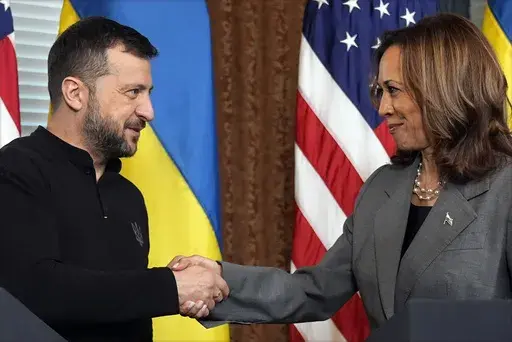 Vice President Kamala Harris, right, and Ukraine's President Volodymyr Zelenskyy, shake hands during their meeting on Sept. 26, 2024, in the vice president's ceremonial office inside the Eisenhower Executive Office Building on the White House complex in Washington. (AP Photo/Jacquelyn Martin, File)