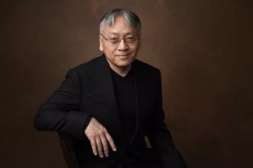 Kazuo Ishiguro poses for a portrait at the 95th Academy Awards Nominees Luncheon in Beverly Hills, Calif., on Feb. 13, 2023. Publisher Alfred A. Knopf announced Thursday that Ishiguro's “The Summer We Crossed Europe in the Rain,” a collection of lyrics written for the million-selling jazz singer Stacey Kent, will be released on March 5. (AP Photo/Chris Pizzello, File)
