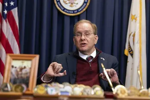 Rep. Jim Langevin, D-R.I., speaks with a reporter in his office, Friday, March 25, 2022, in Warwick, R.I.  After the Capitol riot,  Langevin said he thought briefly that the foolishness and recklessness of dividing the country would finally stop. That didn’t happen, and the Rhode Island Democrat says it’s one reason why he’s leaving Congress.    (AP Photo/Michael Dwyer)