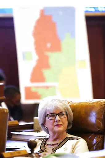 Rep. Robin Robinson, R-Laurel, listens to discussions in the House chamber regarding a congressional redistricting bill, Thursday, Jan. 6, 2022, at the Capitol in Jackson, Miss. (AP Photo/Rogelio V. Solis)