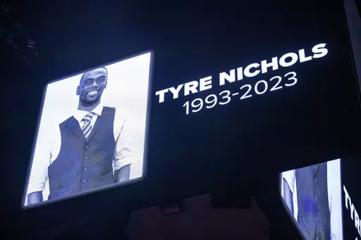 The screen at the Smoothie King Center in New Orleans honors Tyre Nichols before an NBA basketball game between the New Orleans Pelicans and the Washington Wizards, Jan. 28, 2023. Desmond Mills Jr., a former Memphis police officer, is changing his plea from not guilty on federal charges that he violated Nichols' civil rights by fatally beating him after a traffic stop in January 2023. A change of plea hearing has been scheduled for Thursday, Nov. 2, for Mills Jr., according to court documents an