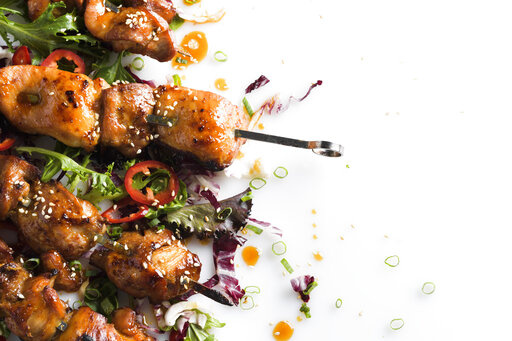 This image released by Milk Street shows a recipe for Maple and Soy-Glazed Chicken Skewers. (Milk Street via AP)