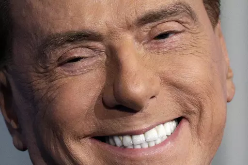Italian former Premier and Forza Italia (Go Italy) party leader, Silvio Berlusconi, smiles during the recording of the Italian state television RAI, Porta a Porta (Door To Door) TV talk show in Rome, Jan. 11, 2018. Silvio Berlusconi, the boastful billionaire media mogul who was Italy's longest-serving premier despite scandals over his sex-fueled parties and allegations of corruption, died, according to Italian media. He was 86. (AP Photo/Andrew Medichini, File)