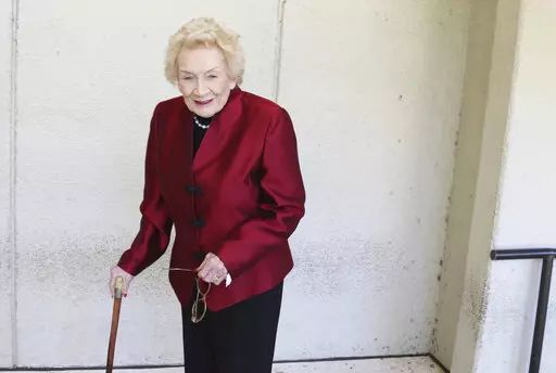 Native Hawaiian heiress Abigail Kawananakoa poses outside a Honolulu courthouse on Oct. 25, 2019. Kawananakoa, the so-called last Hawaiian princess whose lineage included the royal family that once ruled the islands and an Irish businessman who became one of Hawaii’s largest landowners, died on Sunday, Dec. 11, 2022. She was 96. (AP Photo/Jennifer Sinco Kelleher, File)