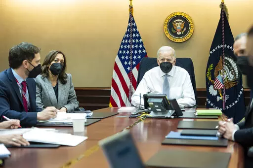 In this image provided by The White House, President Joe Biden and Vice President Kamala Harris and members of the President's national security team observe from the Situation Room at the White House in Washington, on Feb. 2, 2022, the counterterrorism operation responsible for removing from the battlefield Abu Ibrahim al-Hashimi al-Qurayshi, the leader of the Islamic State group. Biden and top national security officials have cited the recent strike killing al-Qaida head Ayman al-Zawahri as ev
