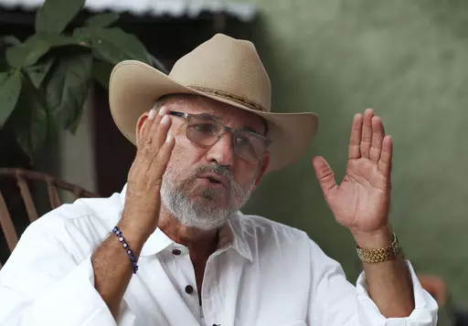 Hipolito Mora, founder of the state's civilian armed self-defense movement, speaks during an interview at his home in Ruana, Michoacan state, Mexico, Oct. 3, 2019. Mora has been killed on Thursday, June 29, 2023, in a successful attempt on his life. (AP Photo/Marco Ugarte, File)